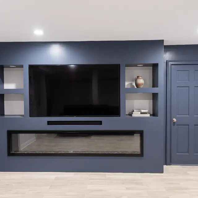 Navy media wall with TV niche and linear fireplace in Newton, MA