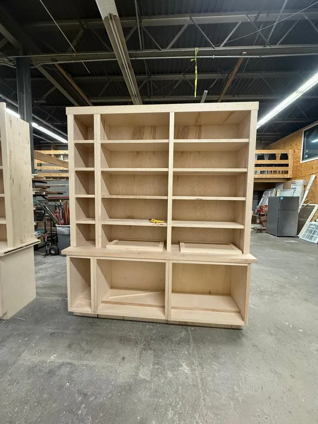 Built-in shelving units assembled in the Innov Builders shop before installation